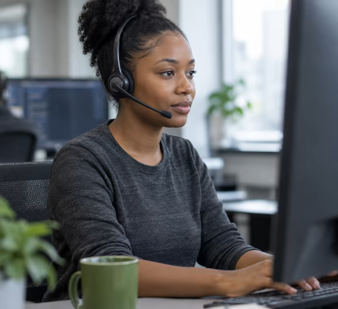 A Gridline engineer on the helpdesk, listening to a caller